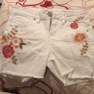 White floral denim shorts